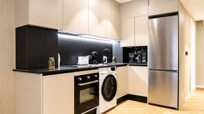 Estúdio superior, vista para a cidade | Cozinha privada