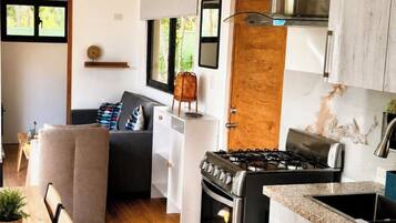 Oven, stovetop, dining tables