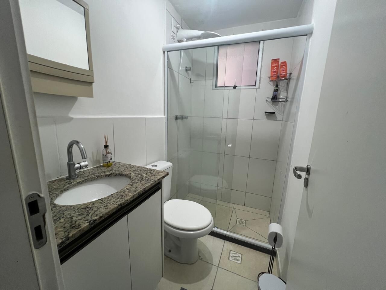 Shower, hair dryer, towels, toilet paper