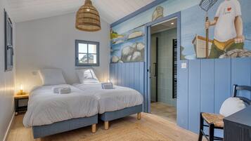 2 slaapkamers, een strijkplank/strijkijzer, reisbedje, wifi