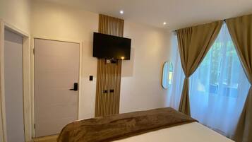 Habitación Deluxe | Ropa de cama de alta calidad, wifi gratis, ropa de cama