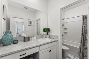Hair dryer, towels, soap, shampoo - Welcome  - Modern, North Sacramento Tropical Home (Sacramento)