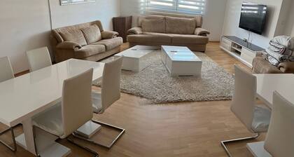 Modern large apartment with 3 bedrooms and free private parking.