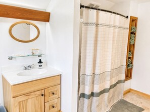 Jetted bath, hair dryer, towels, soap