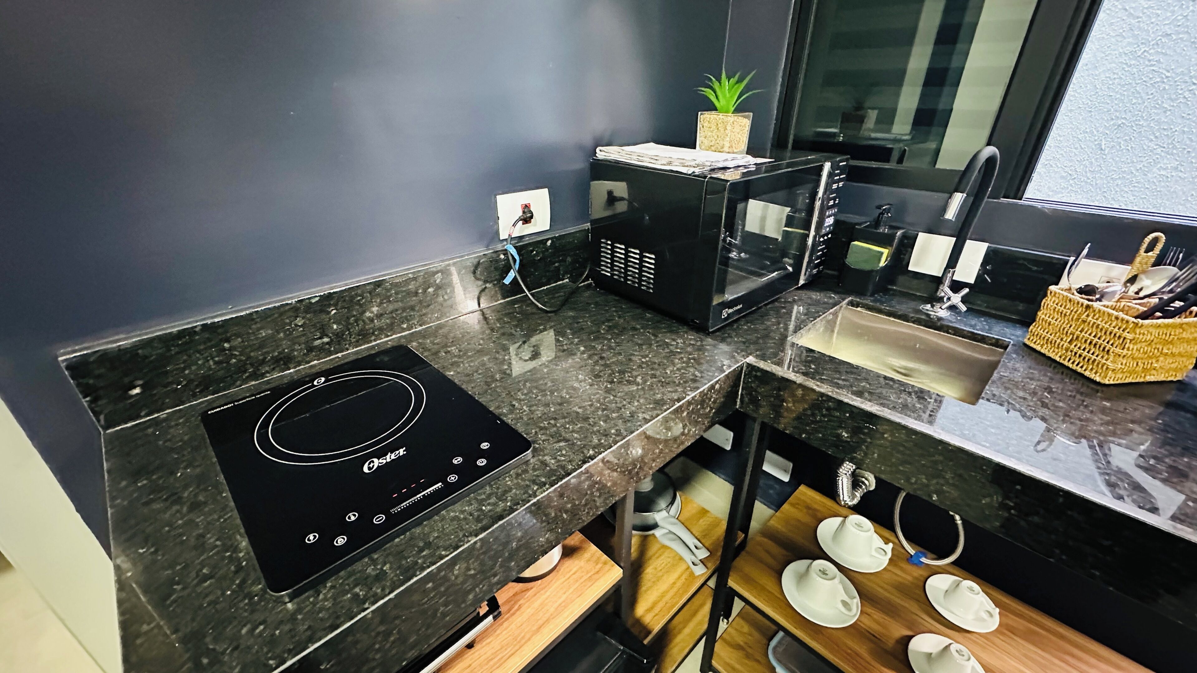 Mini-fridge, microwave, stovetop, cookware/dishes/utensils