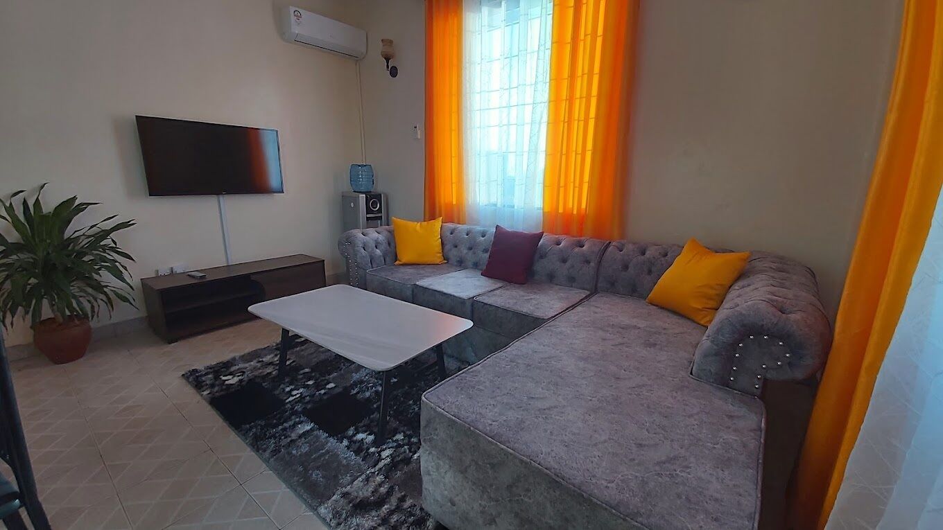 Comfort Apartment | Living area | 32-inch Smart TV with digital channels