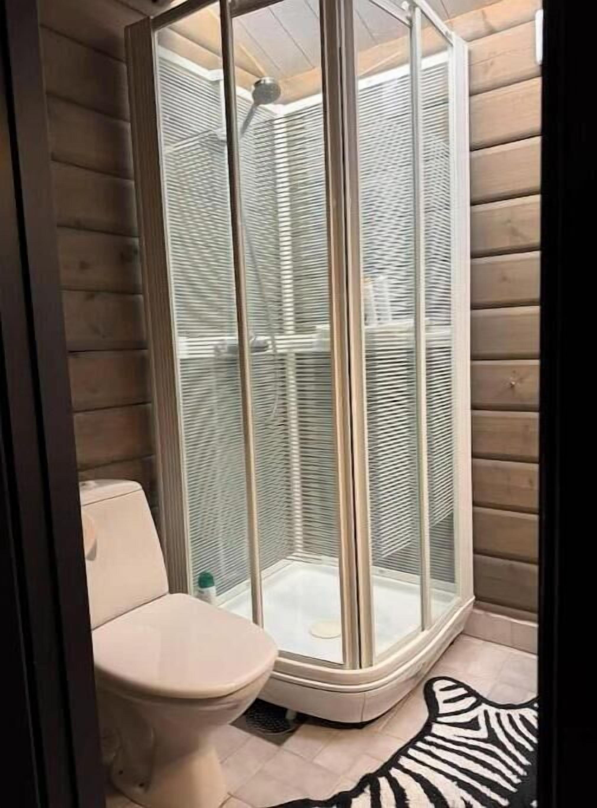 Shower, towels, soap, toilet paper