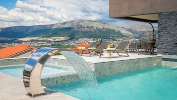 Seasonal outdoor pool, pool umbrellas