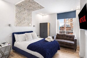 1 habitación, tabla de planchar con plancha, wifi y ropa de cama 