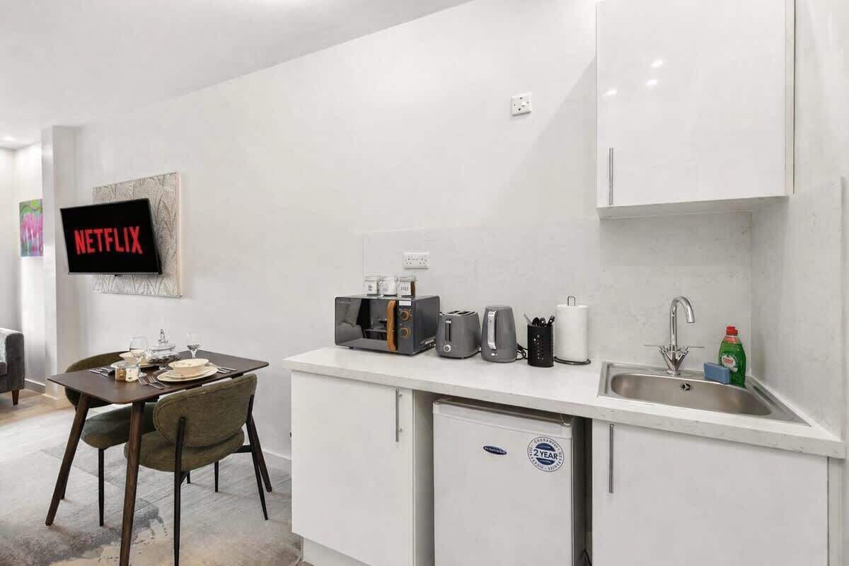 Fridge, microwave, electric kettle, toaster