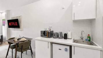 Fridge, microwave, electric kettle, toaster