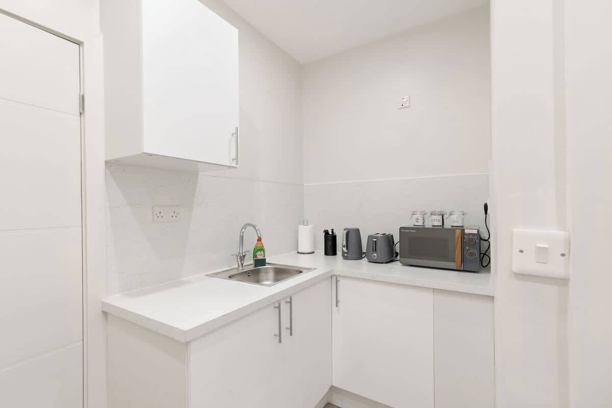 Fridge, microwave, electric kettle, toaster