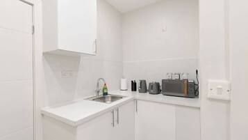 Fridge, microwave, electric kettle, toaster