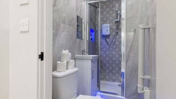 Shower, hair dryer, shampoo