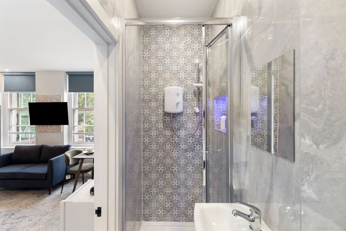 Shower, hair dryer, shampoo