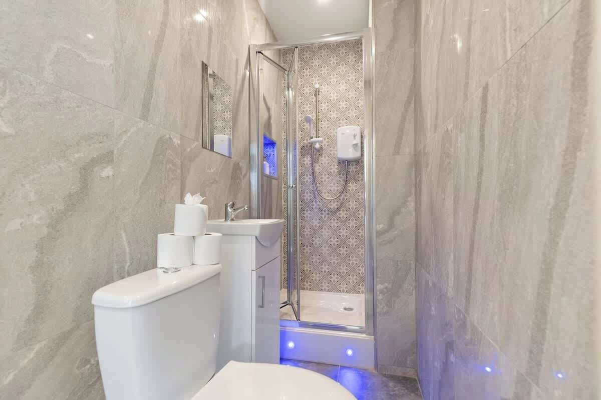 Shower, hair dryer, shampoo