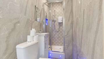 Shower, hair dryer, shampoo