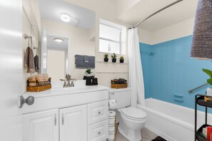 Hair dryer, towels, soap, toilet paper