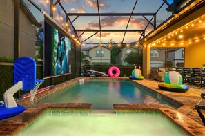 A heated pool - NEW!Racing Simulator|Game Room|Movie Room|Sleep 21 (Kissimmee)