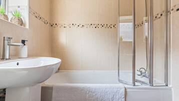 Hair dryer, bidet, towels, soap