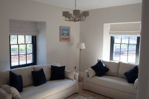 Tranquil 7-bedroom villa in charming Dundrum perfect for groups and families.