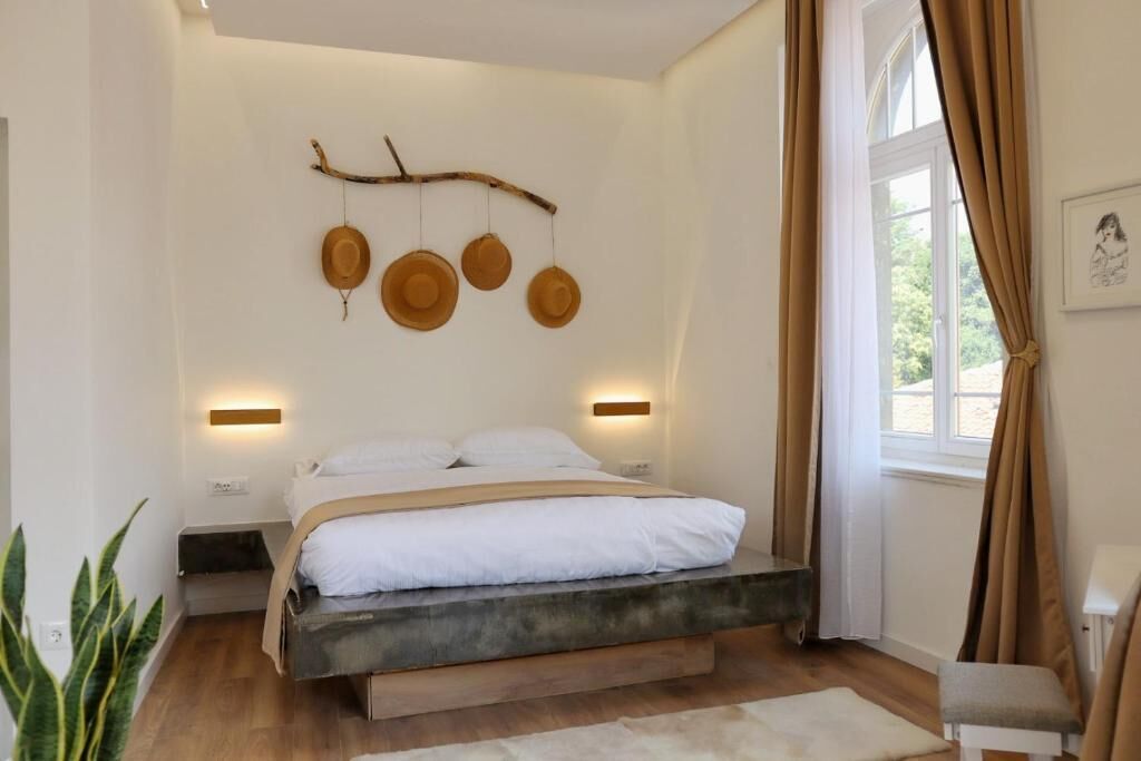 Deluxe Apartment, City View | In-room safe, blackout curtains, iron/ironing board, free WiFi
