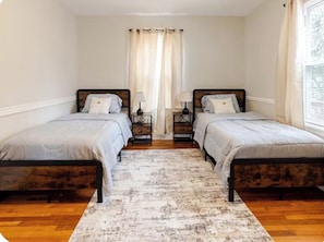 4 bedrooms, desk, iron/ironing board, travel cot