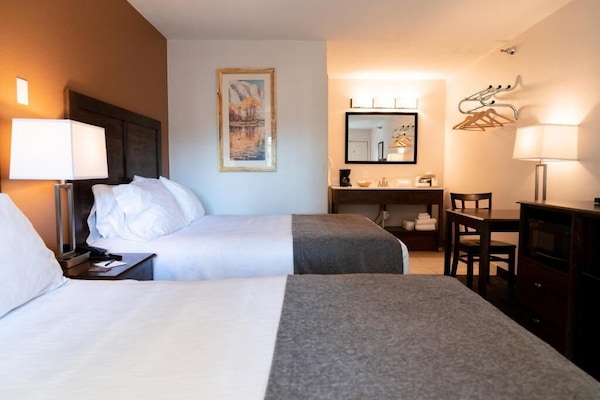 Deluxe Room, 2 Queen Beds | Laptop workspace, iron/ironing board (on request), WiFi (free)