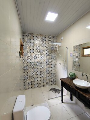 Shower, towels, soap, toilet paper