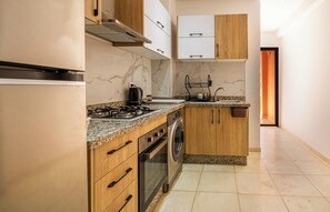 Fridge, microwave, oven, stovetop - Le Nour - Beautiful 2 bedroom apt with Ac in (Marrakesh)