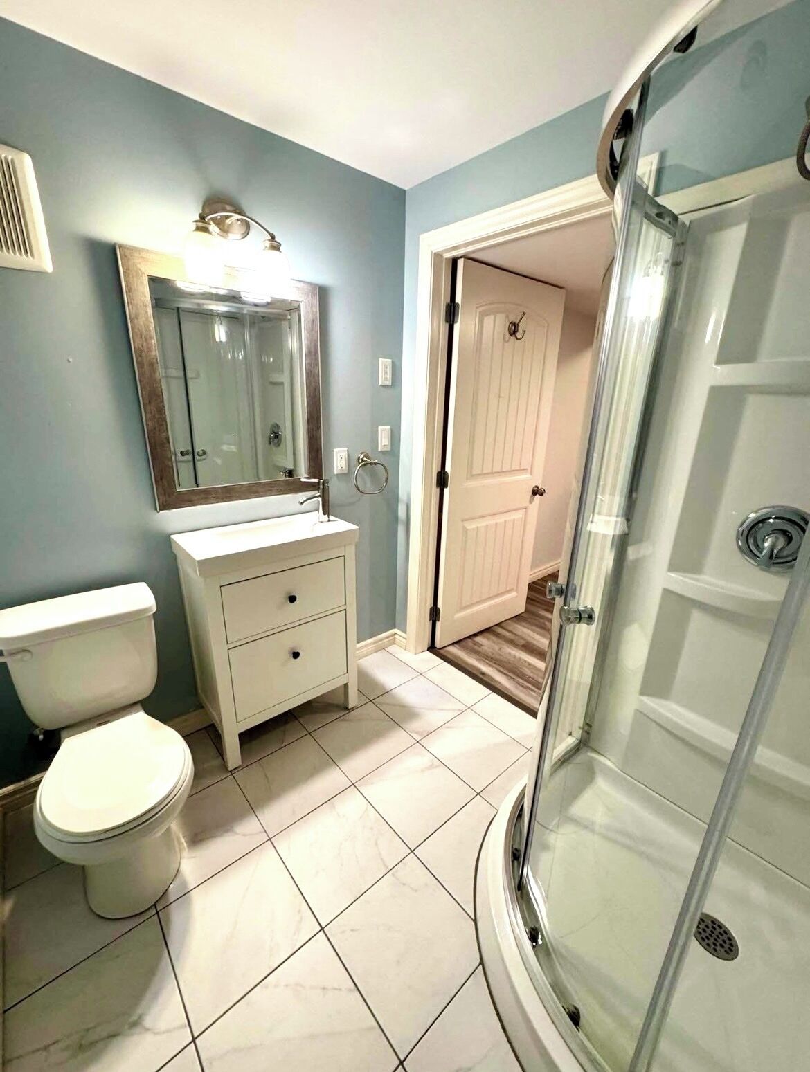 Shower, towels, soap, toilet paper