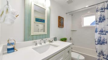 Shower, hair dryer, towels, shampoo