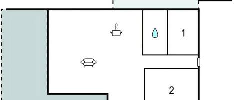 A floor plan with a bathroom, a kitchen, and a living area.