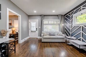 Living area - Fully renovated in 2023 to provide modern amenities in a century home. (Cleveland)