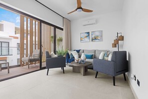 Apartment, Multiple Beds, Pool Access, Pool View (Unique D-202) | Living area - NOK Unique 2BR Apartment by Vistacana Rentals (Punta Cana)