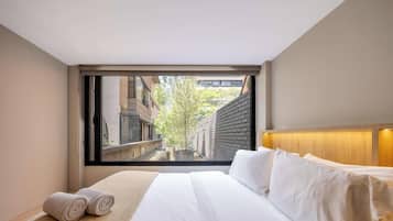 Apartment, 2 Queen Beds, Patio, City View (Gardens B103) | 2 bedrooms