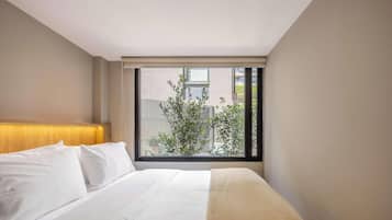 Apartment, 2 Queen Beds, Patio, City View (Gardens B103) | 2 bedrooms