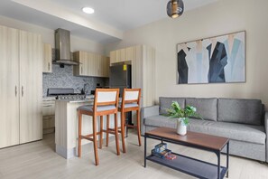 Apartment, 1 Queen Bed with Sofa bed, Pool Access, City View (Panorama G1-211) | Living area - NOK Modern 1BR Apartment With Terrace in Vistacana (Punta Cana)