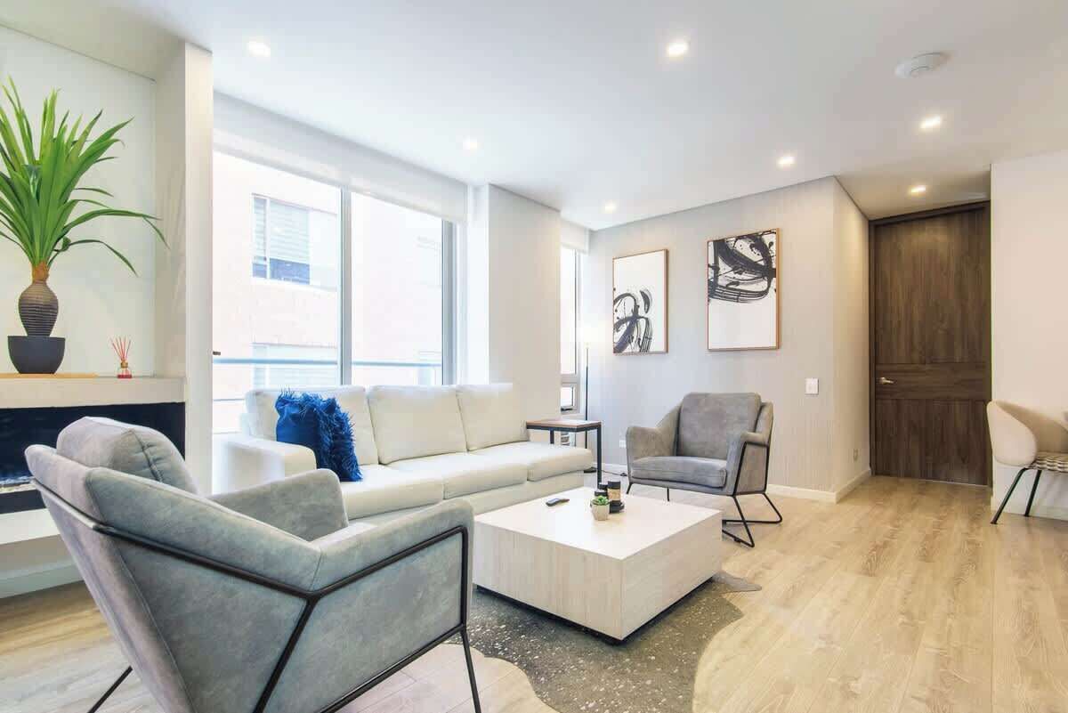 Apartamento, varias camas, bañera de hidromasaje, vistas a la ciudad (Balcones 303) | Zona de estar