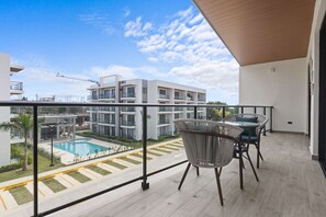 Apartment, 2 Queen Beds, Pool Access, Pool View (The Towers E301) | Outdoor dining - NOK Elegant 2BR Apt by Vistacana (Punta Cana)
