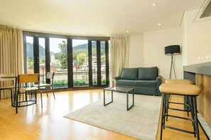 Apartment, 2 Queen Beds, Balcony, City View (La Primera 304 Live) | Living area - NOK Cozy 2 Br apt in Candelaria (Bogotá)