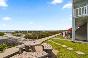 Terrace/patio - Beachside Ground Floor Walkout. Heated Pool. BBQ Grills ☀️ (Cocoa Beach)