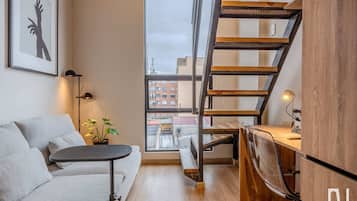 Departamento, 1 cama Queen size, balcón, vista a la ciudad (Vivo52 611) | Área de sala de estar