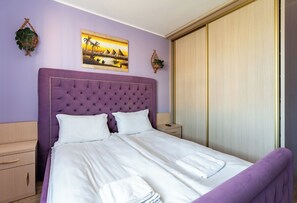 2 dormitorios, tabla de planchar con plancha, wifi y ropa de cama