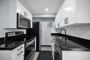 Fridge, microwave, oven, stovetop - Bright Designer Villa near Fort Lauderdale / Beach (Wilton Manors)
