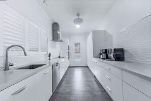 Microwave, oven, stovetop, dishwasher - Ocean’s Edge – Private Pool, Oceanfront Views & Peaceful Setting (Cannonvale)