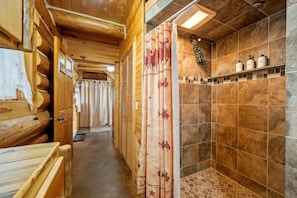 Shower, hair dryer, towels, shampoo