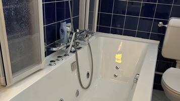 Shower, jetted bath, hair dryer, towels
