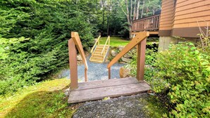 A wooden deck with a staircase leading to a house. - Fc42 Fabulous Mountain View Grand Resort Spa (Bretton Woods)