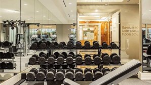 A gym with weight racks and exercise equipment. - Renovated Trump Hotel Las Vegas Studio Strip Views 2803 (Las Vegas)